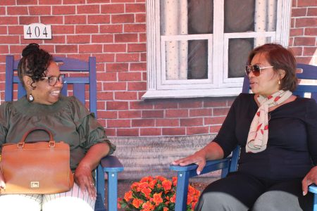 Brenda Griffin, legacy resident of Historic Old Fourth Ward, shares memories during "The Porch" set-up at William Walker Recreation Center.